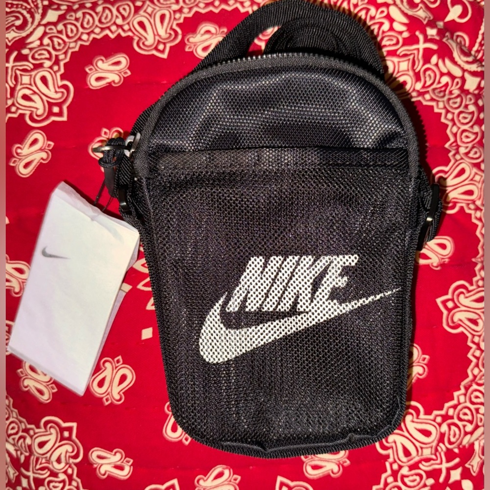 Nike crossbody small pouch in black w white logo on front